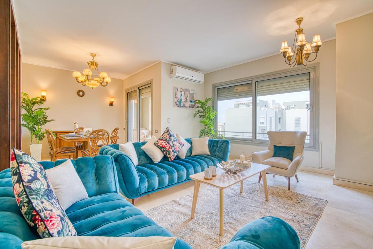 The Suites Near Auc By Elegant Каир Экстерьер фото