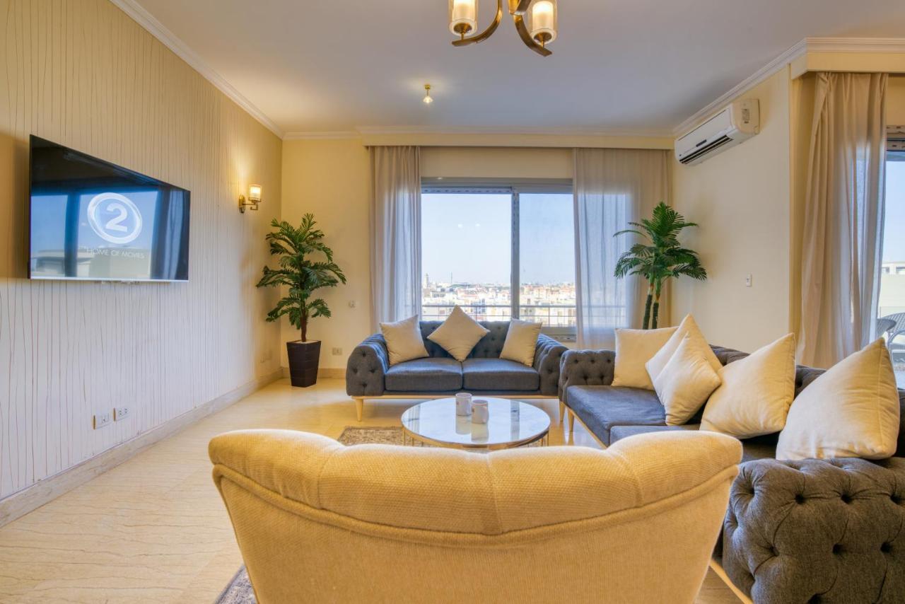 The Suites Near Auc By Elegant Каир Экстерьер фото