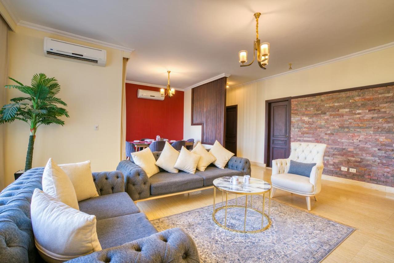 The Suites Near Auc By Elegant Каир Экстерьер фото