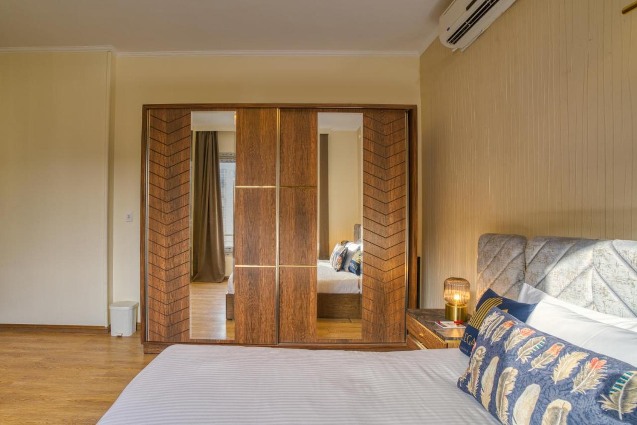 The Suites Near Auc By Elegant Каир Экстерьер фото