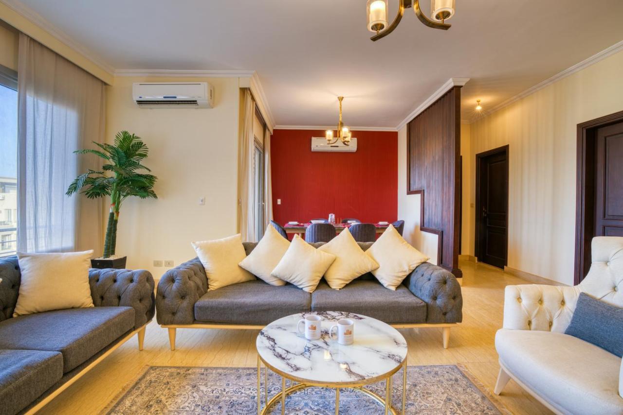The Suites Near Auc By Elegant Каир Экстерьер фото