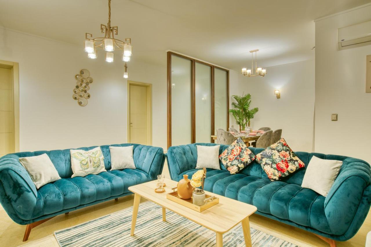 The Suites Near Auc By Elegant Каир Экстерьер фото