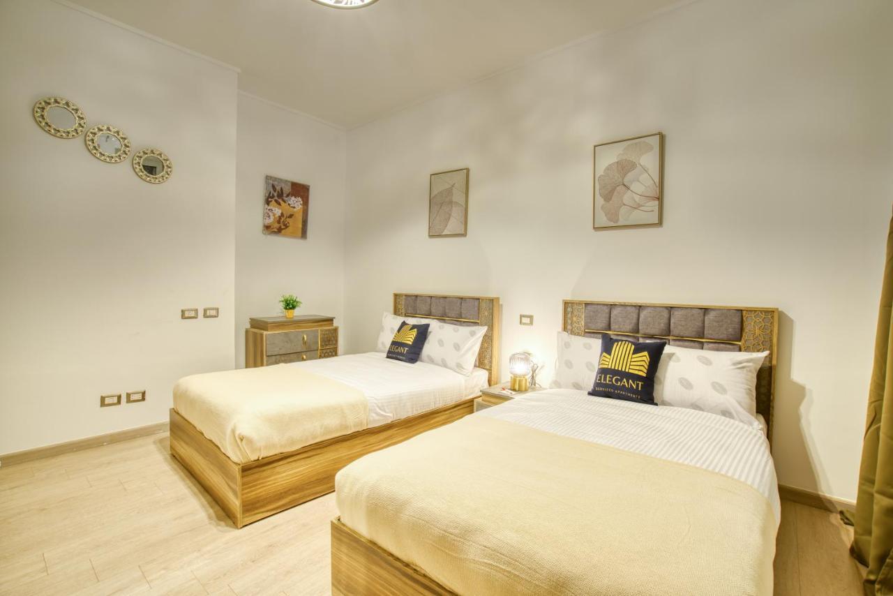 The Suites Near Auc By Elegant Каир Экстерьер фото