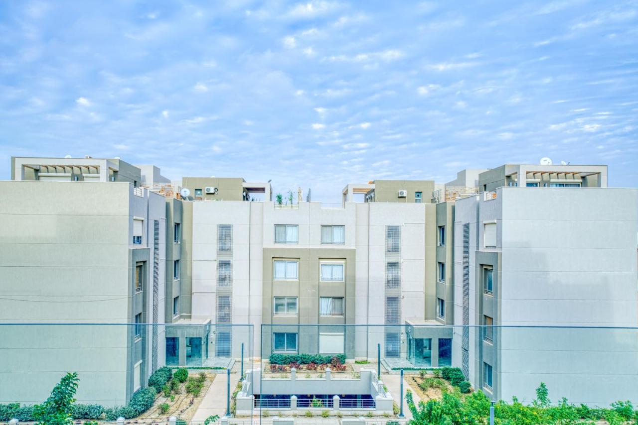 The Suites Near Auc By Elegant Каир Экстерьер фото
