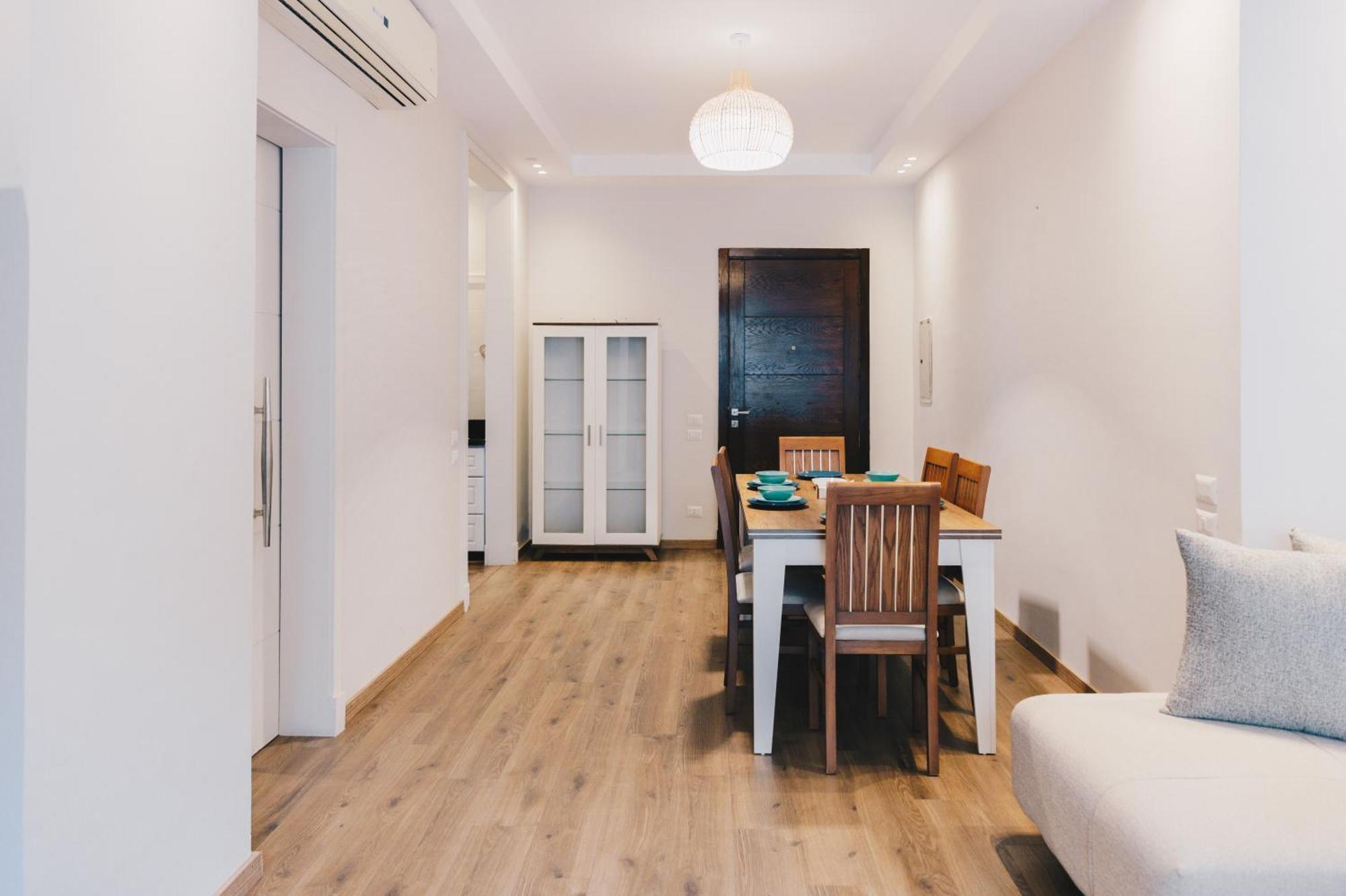 The Suites Near Auc By Elegant Каир Экстерьер фото