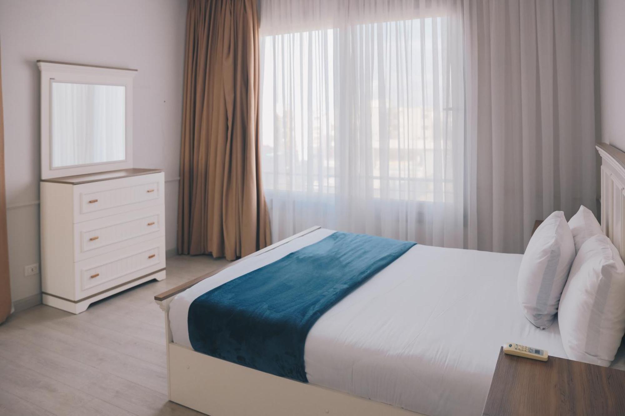 The Suites Near Auc By Elegant Каир Экстерьер фото